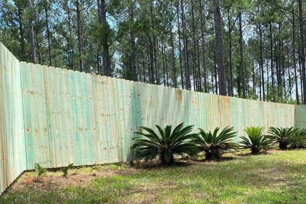 Wood fence installation in Pace Florida